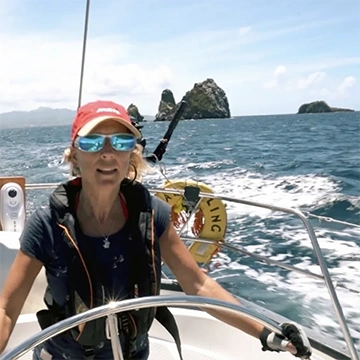 Caribbean sailing lady at helm