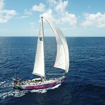 Offshore sailing yacht under spinnaker