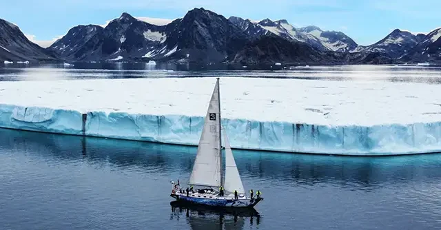 yacht by iceberg