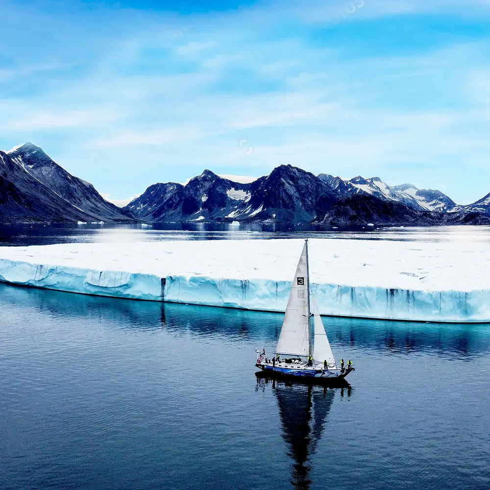 yacht by iceberg